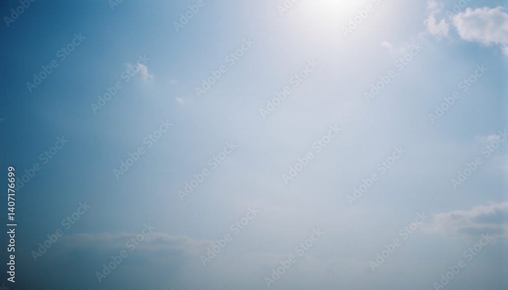 Fototapeta premium Blue Sky with Clouds: A tranquil image showing an expansive blue sky gently diffused with a few soft clouds, offering a sense of calmness, peace, and endless possibilities.