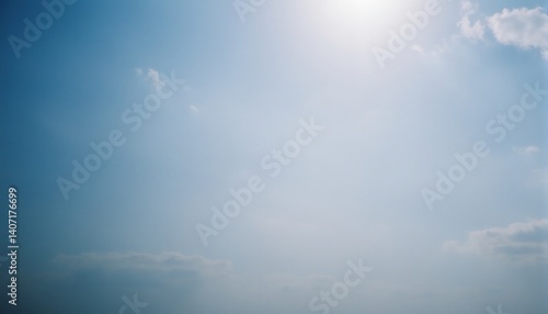 Blue Sky with Clouds: A tranquil image showing an expansive blue sky gently diffused with a few soft clouds, offering a sense of calmness, peace, and endless possibilities.