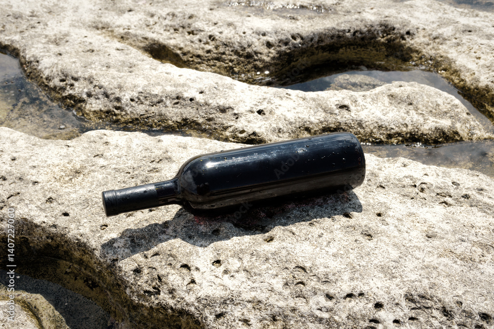 Bottle of wine on the shore. Bottle of wine on the shore.