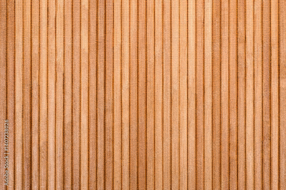 Parallel wooden slats forming warm brown textured background Parallel wooden slats forming warm brown textured background