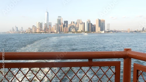 New York City skyline from ferry boat to Staten Island. Manhattan downtown. World Trade Center skyscraper from ferryboat. River waterfront sunset panorama, riverfront buildings architecture, FiDi, USA