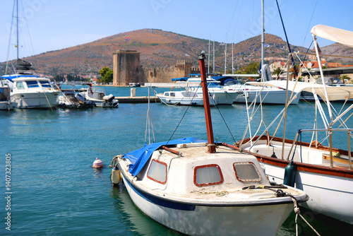 Beautiful old buildings, boats and yachts on the promenade in Trogir, Croatia. Sunny summer day in Trogir.