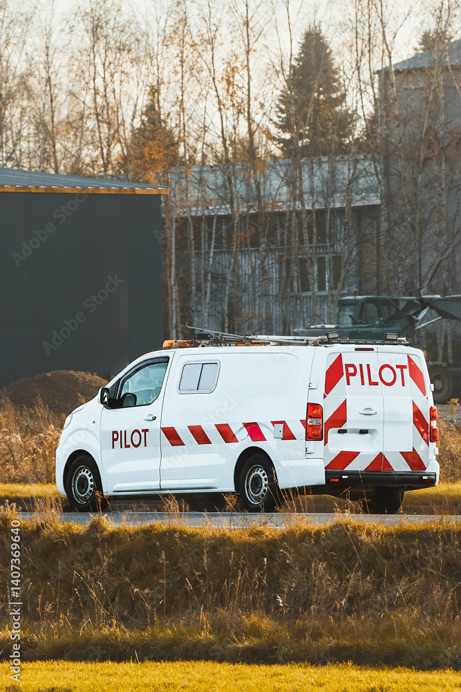 Pilot van parked in rural area