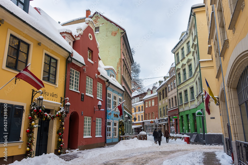 Riga, Latvia, 2 December 2023: Snowy streets of Riga historic center in winter