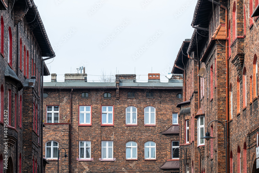 Old brick tenement houses in a workers' housing estate. Katowice, Nikiszowiec. Poland