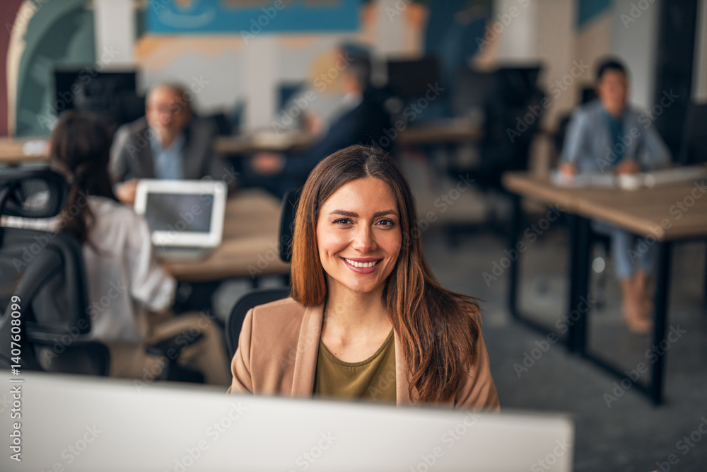 Smiling Professional in Modern Office Environment with Colleagues