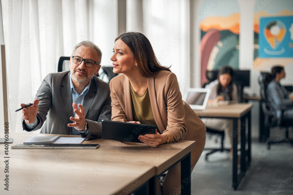 Business Professionals Collaborating in a Bright and Modern Office Workspace