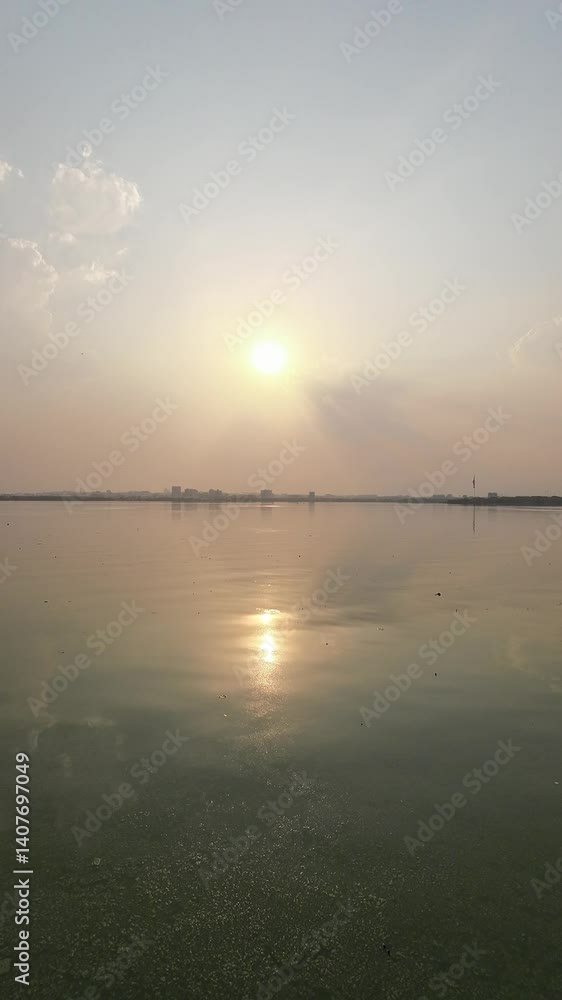 Sunset Reflecting On Calm Tranquil Lake During The Sunset Time Vertical Video Sunset Reflecting On Calm Tranquil Lake During The Sunset Time Vertical Video