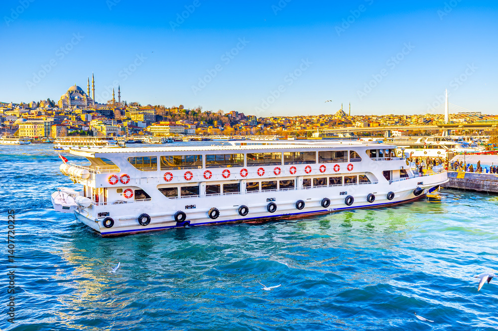 Passenger ferries at Karakoy pier next to Galata Bridge, Istanbul, Turkey