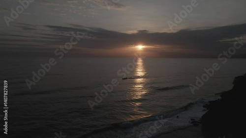 Sunset with a boat in Tayrona, Colombia