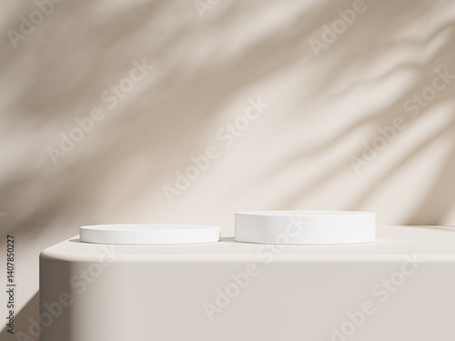 Two white circular podiums with subtle shadows from a tree on a smooth light beige surface.