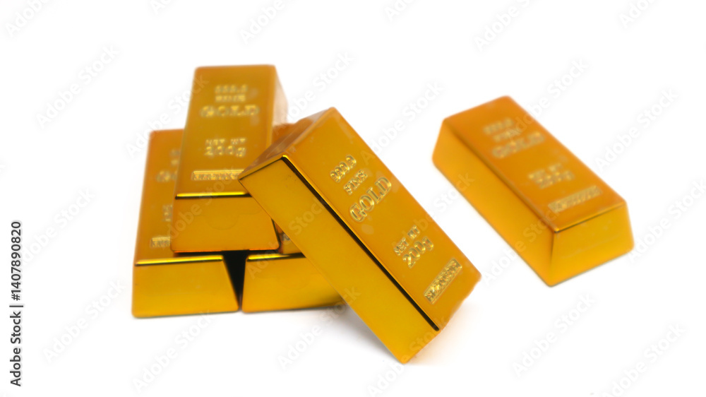 shiny gold bullion isolated on white background. jewelry. currency. future savings. exchange tool. investment. financial concept shiny gold bullion isolated on white background. jewelry. currency. future savings. exchange tool. investment. financial concept