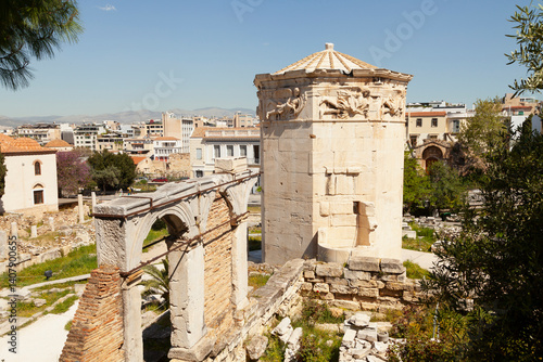Photos Tower of the Winds is situated in the Roman Agora of Athens, between the quarter