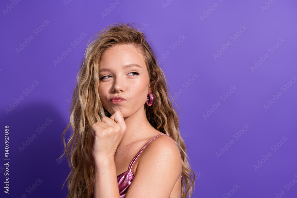 Photo of pretty young girl look empty space ponder wear shiny top isolated on violet color background