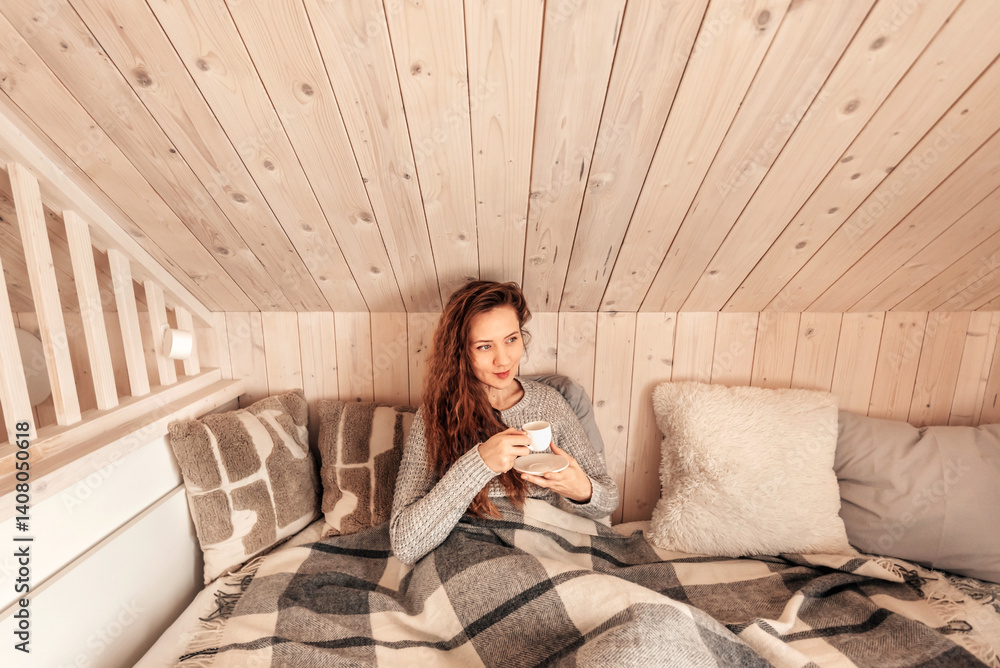 Happy Woman Drinking Morning Coffee in Bed