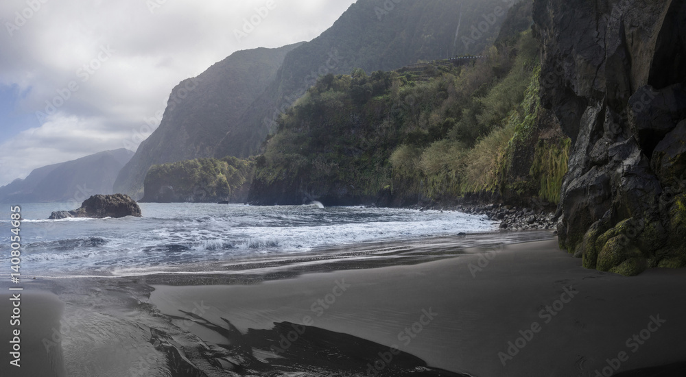 Visit Madeira Seixal Port Beach to experience its stunning black sand and scenic cliffs along the coast