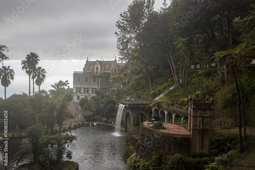 Obraz na płótnie Scenic view of Monte Palace Garden in Madeira featuring lush greenery and an elegant mansion amidst a cloudy sky w salonie