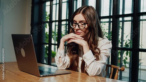 The Woman with Laptop Focused
