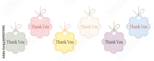 Collection of pastel label tags with decorative string, scalloped edge, stitched border and thank you inscription. Ideal for packaging, branding, handmade goods and greeting cards.