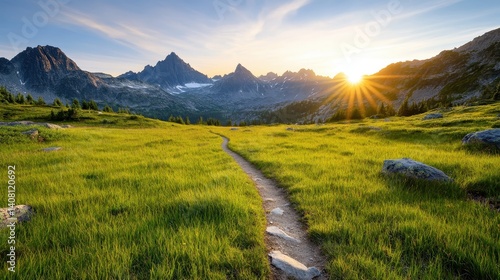 Fototapeta Naklejka Na Ścianę i Meble -  A breathtaking sunrise illuminating a mountain landscape over a winding pathway, highlighting the beauty of nature, inviting exploration and admiration by outdoor enthusiasts.