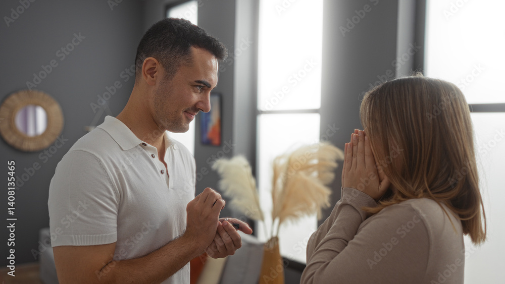 Obraz premium Man proposing to woman in elegant living room filled with love, excitement, and emotion, creating a memorable couple moment indoors in an apartment setting.