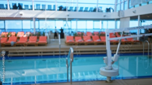 Blurred indoor scene on a luxury cruise with out of focus bokeh capturing sunlit poolside and defocused lounge chairs hinting relaxation and vacation ambiance.