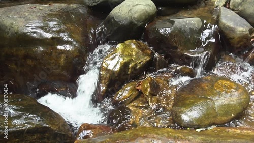 water flowing into the rocks