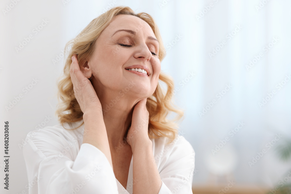 Smiling middle aged woman at home. Space for text Smiling middle aged woman at home. Space for text