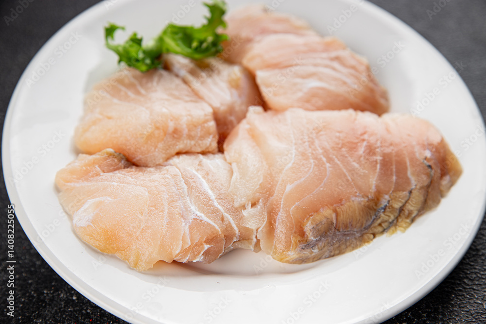 Rish fillet white fish raw seafood appetizer dish organic product fresh tasty gourmet food background on the table rustic food top view copy space Rish fillet white fish raw seafood appetizer dish organic product fresh tasty gourmet food background on the table rustic food top view copy space