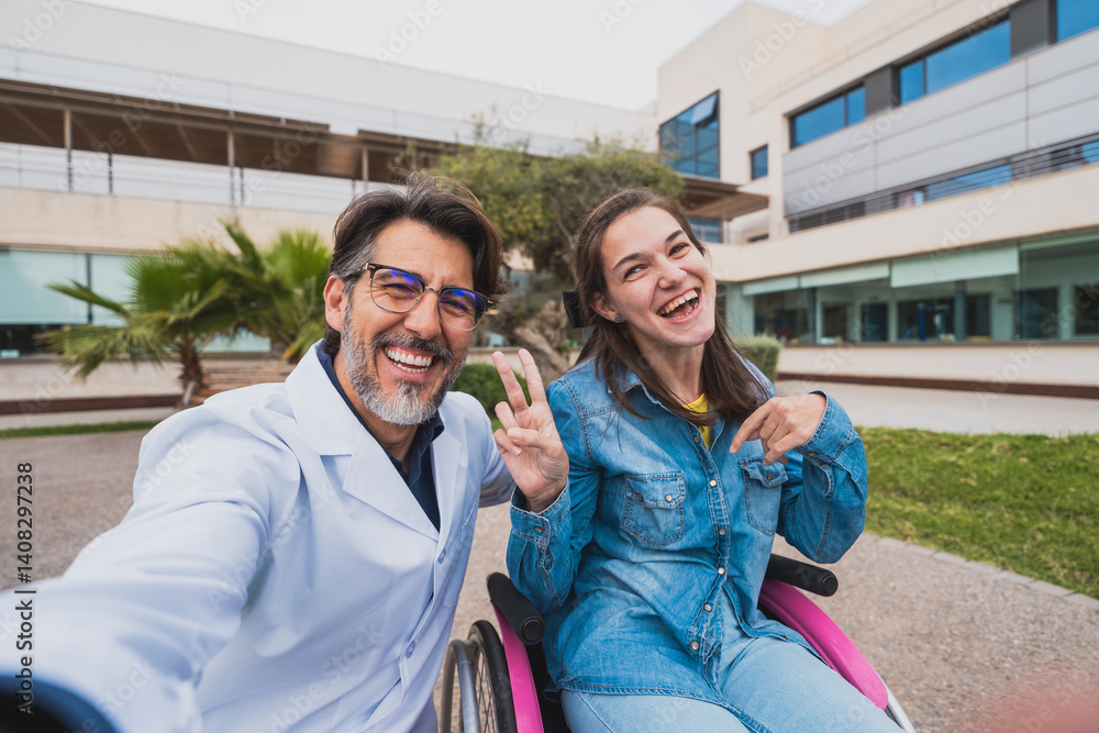 Naklejka premium Young woman with cerebral palsy and doctor taking cheerful selfie - Smiling young woman with cerebral palsy poses with her doctor for a joyful selfie after medical session. Concept of cerebral palsy.