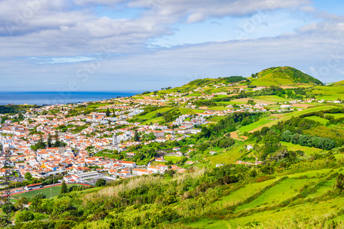View of Horta town and green hills on coast of Faial island, Azores, Portugal, Faial island, Azores, Portugal