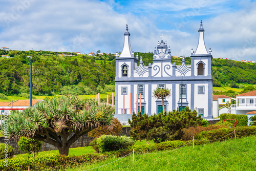 Obraz na płótnie Traditional style old church in green tropical landscape near Almoxarife beach, Faial island, Azores, Portugal w salonie