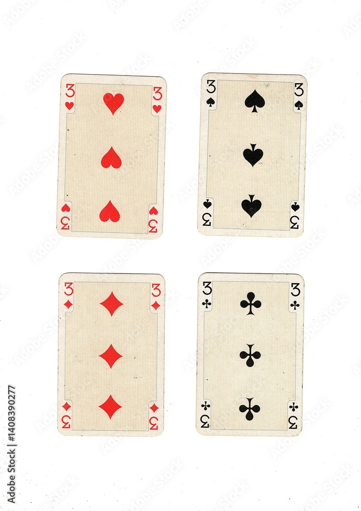Obraz premium A hand of antique playing cards showing four of the same value.