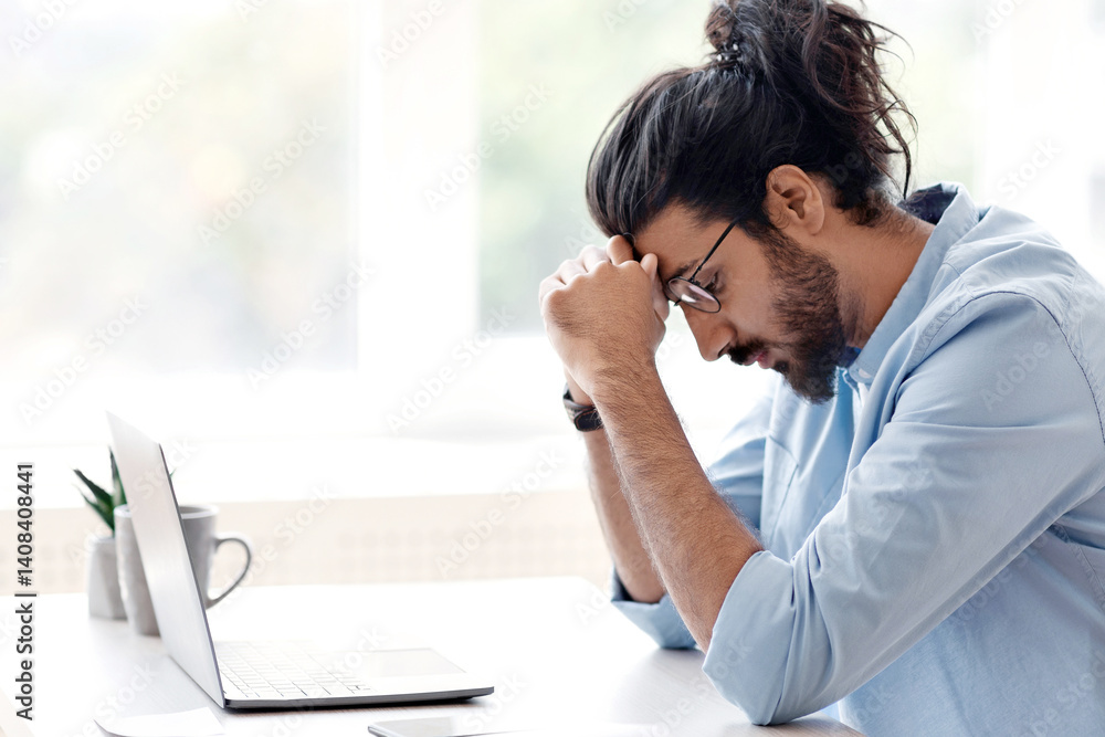 Upset Eastern Freelancer Guy Suffering Lack Of Inspiration While Working On Online Project With Laptop At Home, Sitting At Desk Near Window And Touching Head In Despair, Side View With Copy Space Upset Eastern Freelancer Guy Suffering Lack Of Inspiration While Working On Online Project With Laptop At Home, Sitting At Desk Near Window And Touching Head In Despair, Side View With Copy Space