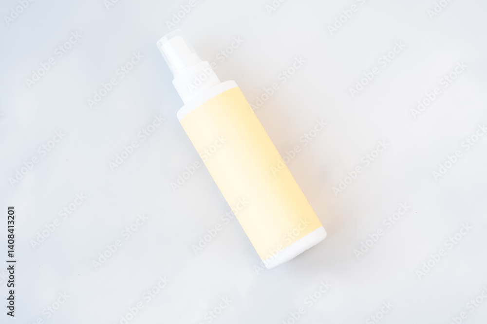 Cosmetic Spray Bottle on Light Background Cosmetic Spray Bottle on Light Background