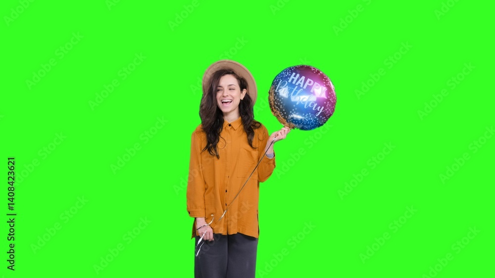 Happy young woman in hat with balloon sending kiss on the chroma key Happy young woman in hat with balloon sending kiss on the chroma key