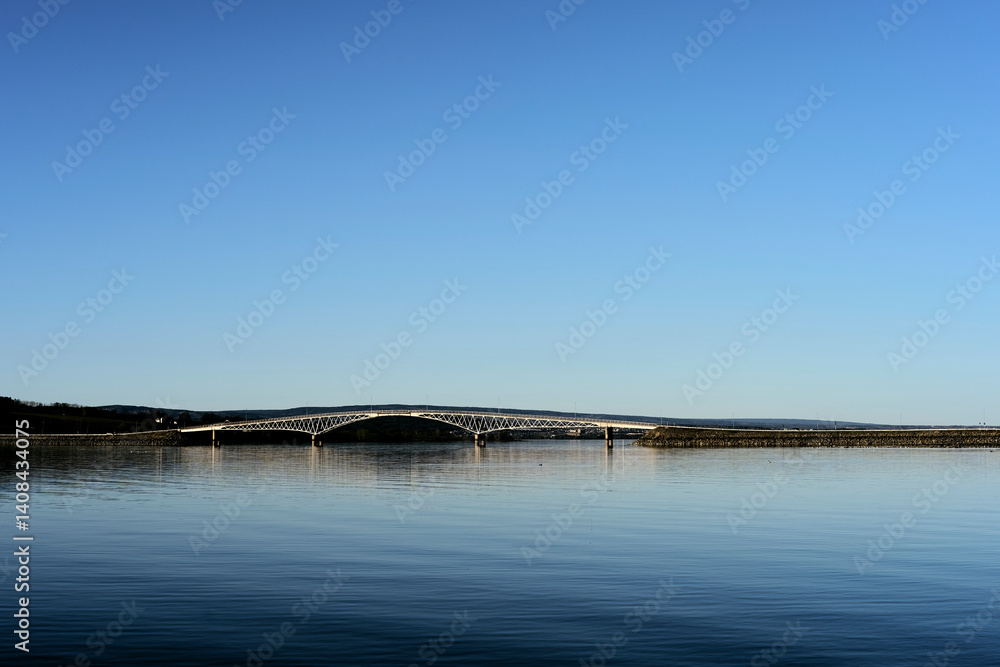 Nessundet truss bridge in Lake Mjøsa seen from the Helgøya Island in April 2025. Nessundet truss bridge in Lake Mjøsa seen from the Helgøya Island in April 2025.