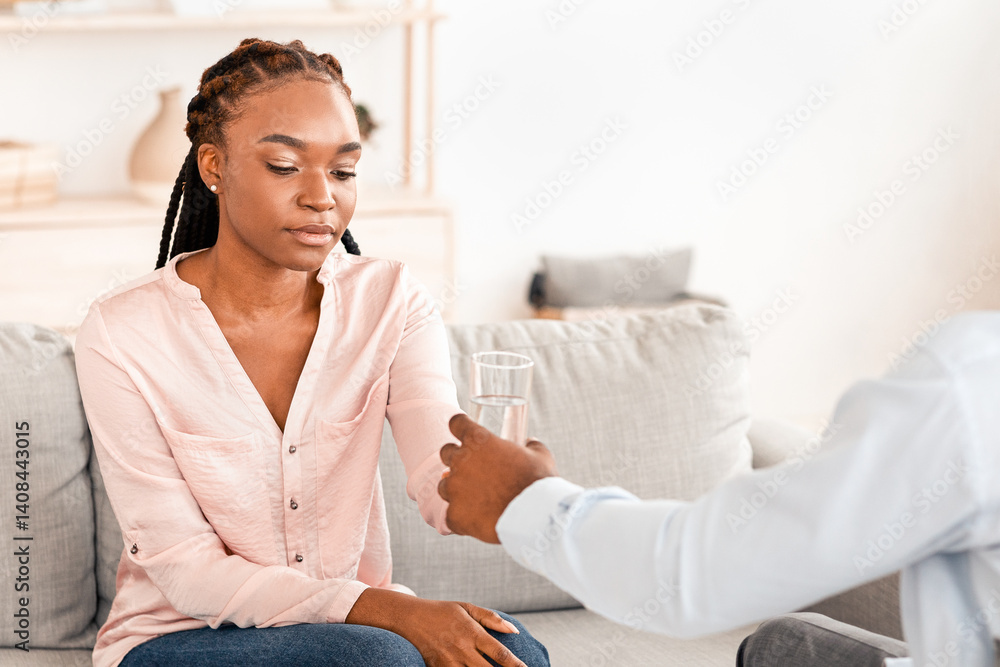 Psychotherapist Comforting Upset African American Lady During Therapy Session, Giving Glass Of Water, Young Black Woman With Mental Problems Sitting On Couch At Counselor's Office, Free Space Psychotherapist Comforting Upset African American Lady During Therapy Session, Giving Glass Of Water, Young Black Woman With Mental Problems Sitting On Couch At Counselor's Office, Free Space