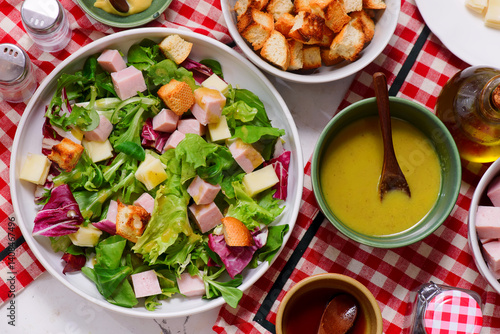 Photos Parisian salad with cheese, ham and croutons