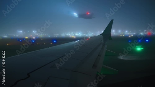 Airport LAX, Los Angeles, California, USA - MARCH 18, 2025: The captivating view seen from an airplane window as it taxis slowly through dense fog and rain following a smooth landing process