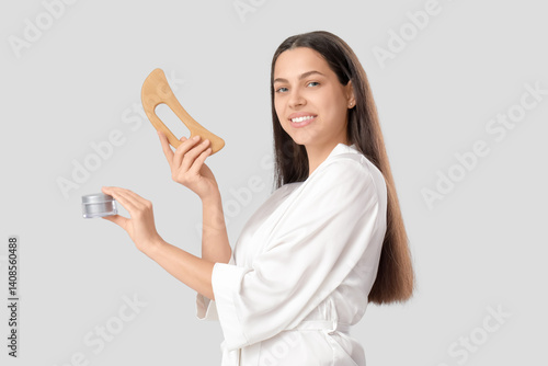 Young woman with wooden scr...