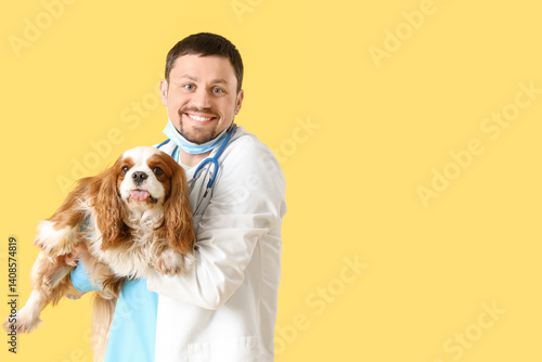 Male veterinarian with cute...