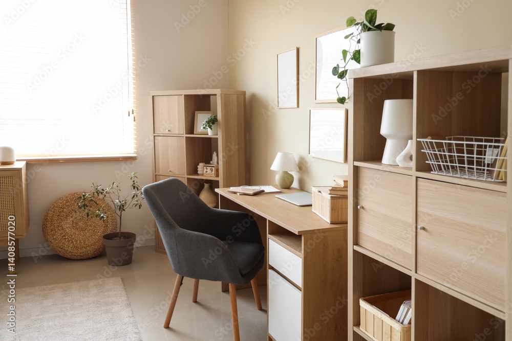 Fototapeta premium Interior of living room with workplace and shelf units