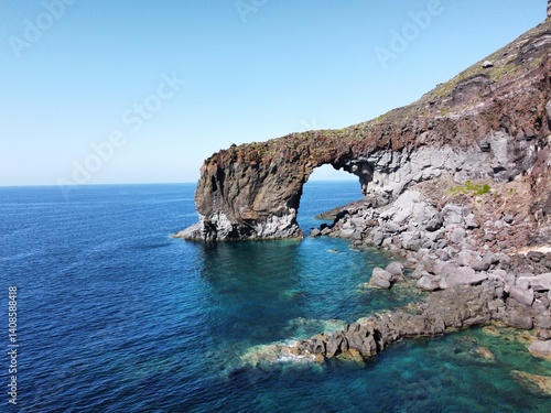 Natural Rock Arch at the Coast, in the Aeolian Islands, Italy