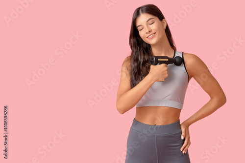Sporty young woman using pe...