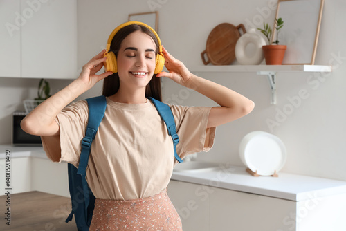 Happy young woman with yell...