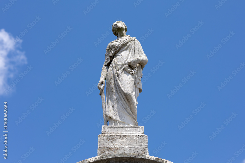 Fototapeta premium Beautiful angel tombstone topper sculpture