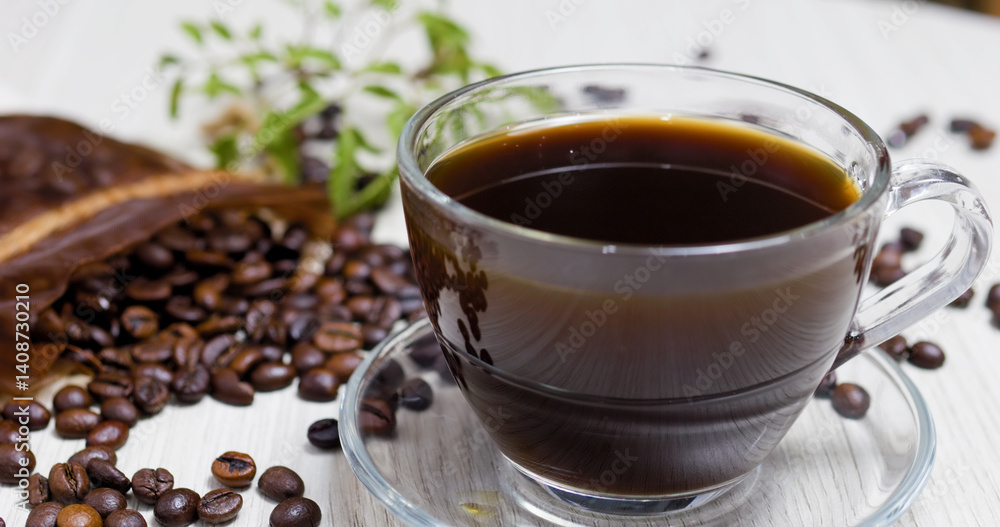 Steaming cup of black coffee sits on a wooden table, surrounded by roasted coffee beans spilling from a burlap sack, creating a warm and inviting scene for coffee lovers Steaming cup of black coffee sits on a wooden table, surrounded by roasted coffee beans spilling from a burlap sack, creating a warm and inviting scene for coffee lovers