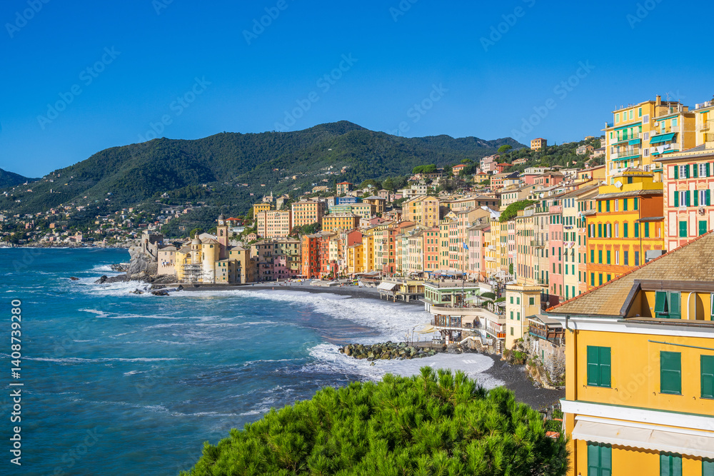 Obraz premium The village of Camogli is a fishing village and tourist resort located on the west side of the peninsula of Portofino, on the Golfo Paradiso Riviera di Levante, Italy