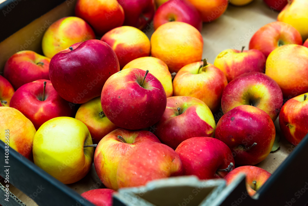 Image of fresh apples on the counter in supermarket, nobody Image of fresh apples on the counter in supermarket, nobody